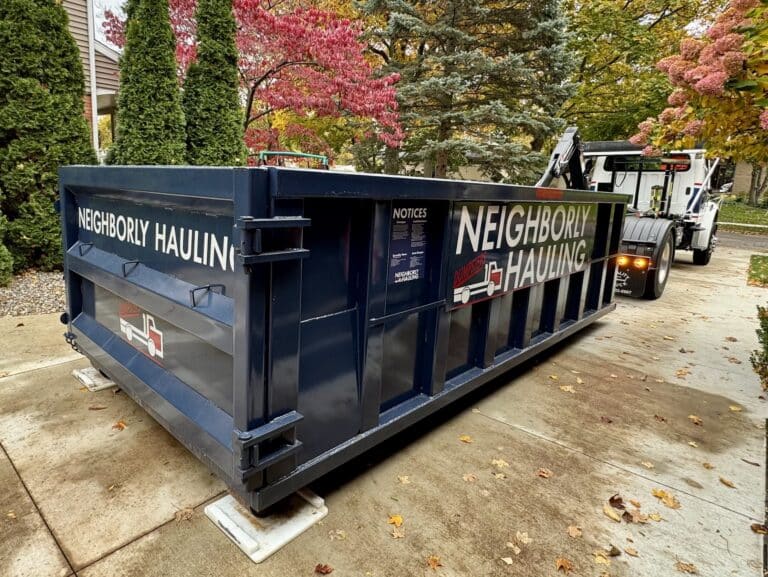 17 yard dumpster rental with driveway protection placed at a residential home in West Michigan