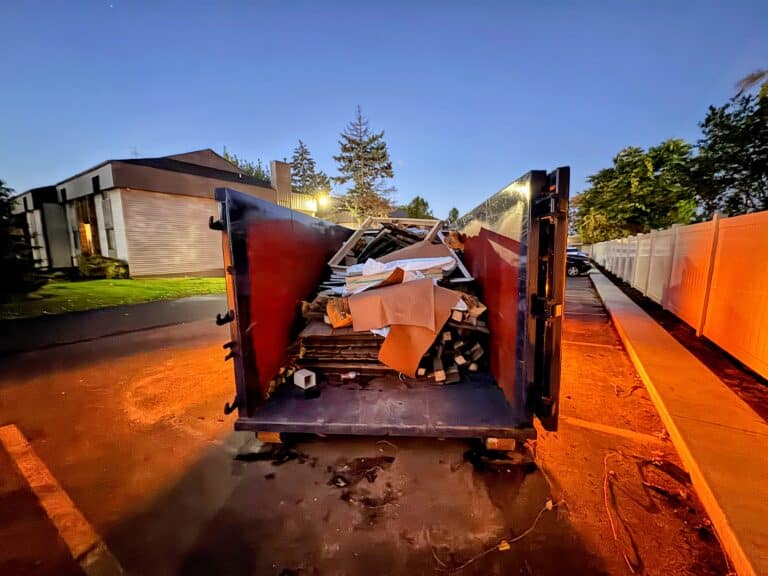 Roll-off dumpster delivered to residential driveway in Grand Rapids Michigan